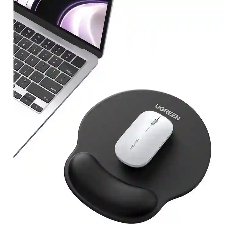 Mouse pad with wrist rest